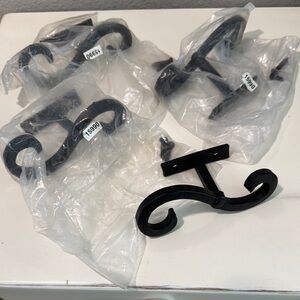 Two pairs Black Wrought Iron shutter dogs